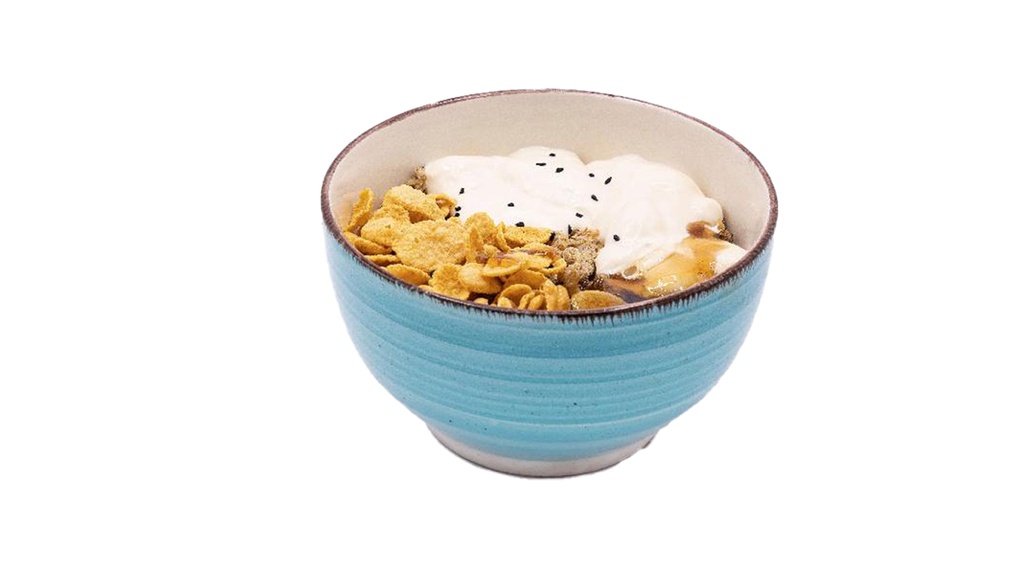 Areeka with cornflakes, cream, and honey  